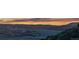 Night view overlooking distant mountains and city lights at 696 Eveningsong Dr, Castle Rock, CO 80104