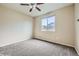 Simple bedroom with carpeted floor and ceiling fan at 5353 Royal Pine St, Brighton, CO 80601