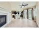 Open dining area with wood floors, an island, and patio access at 5353 Royal Pine St, Brighton, CO 80601