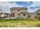 Two-story home with backyard and shed at 5353 Royal Pine St, Brighton, CO 80601