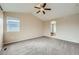 Main bedroom with carpeted floor and ensuite bathroom at 5353 Royal Pine St, Brighton, CO 80601