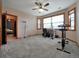 Bright bedroom with carpet, a ceiling fan, and natural light from the windows at 6533 S Quemoy Way, Aurora, CO 80016