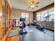 Home gym with rubber flooring and fitness equipment, filled with natural light at 6533 S Quemoy Way, Aurora, CO 80016