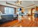 Open main bedroom boasts hardwood floors, a fireplace, and a luxurious layout at 6533 S Quemoy Way, Aurora, CO 80016