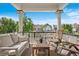 Charming porch providing a relaxing outdoor seating area with picturesque neighborhood views at 122 N Logan St, Denver, CO 80203