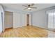 Large bedroom with hardwood flooring, natural light and closets at 20 Scott Dr, Broomfield, CO 80020