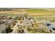 Captivating aerial shot displaying a peaceful neighborhood with well-kept houses, lush landscapes, and convenient road access at 452 N Finch Ave # 452B, Lafayette, CO 80026