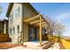 Outdoor patio with a wood pergola, stepping stones, and private fenced backyard at 452 N Finch Ave # 452B, Lafayette, CO 80026