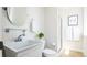 Clean and modern bathroom featuring a deep sink, toilet, and glass-enclosed shower at 452 N Finch Ave # 452B, Lafayette, CO 80026