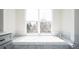 Bright bathroom features a large tub with views of the surrounding nature at 452 N Finch Ave # 452B, Lafayette, CO 80026