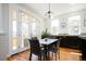 Dining space next to kitchen featuring hardwood floors, modern decor, and plenty of light at 452 N Finch Ave # 452B, Lafayette, CO 80026