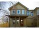 Two-story townhome with a cozy front porch, perfect for relaxing and enjoying the neighborhood at 452 N Finch Ave # 452B, Lafayette, CO 80026
