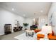 Spacious living room with piano, modern furniture, and recessed lighting at 452 N Finch Ave # 452B, Lafayette, CO 80026