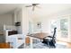 Home office with hardwood flooring, a ceiling fan, and a desk with an ergonomic chair at 452 N Finch Ave # 452B, Lafayette, CO 80026