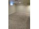 Finished basement with carpet flooring and recessed lighting at 1510 S Macon St, Aurora, CO 80012