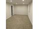 Finished basement with carpet flooring and recessed lighting at 1510 S Macon St, Aurora, CO 80012