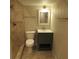 Updated bathroom features a tiled shower and modern vanity at 1510 S Macon St, Aurora, CO 80012