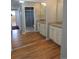 A bathroom and closet mirrored doors with hardwood flooring at 1510 S Macon St, Aurora, CO 80012