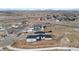High angle view of a stylish home in a rural community with a private driveway and sprawling landscape at 10291 E 142Nd Ave, Brighton, CO 80602