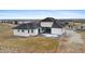 An aerial view of the home and surrounding landscape at 10291 E 142Nd Ave, Brighton, CO 80602