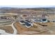 Aerial view of a contemporary home with a private driveway on a spacious lot in a rural community at 10291 E 142Nd Ave, Brighton, CO 80602