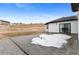 Backyard with a stone tiled patio and grass at 10291 E 142Nd Ave, Brighton, CO 80602