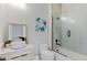 Contemporary bathroom with a sleek vanity, modern fixtures, and a stylish shower with glass enclosure at 10291 E 142Nd Ave, Brighton, CO 80602