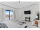 Bright bedroom with ample natural light, tray ceilings, and sliding glass door at 10291 E 142Nd Ave, Brighton, CO 80602