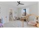 Bright and playful bedroom with a cozy bed, colorful accents, and easy access to an attached bathroom at 10291 E 142Nd Ave, Brighton, CO 80602