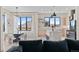Open-concept kitchen and dining area featuring a marble island and stainless steel appliances at 10291 E 142Nd Ave, Brighton, CO 80602