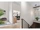 Spacious living area showcasing modern design, staircase, and seamless transition to the kitchen at 10291 E 142Nd Ave, Brighton, CO 80602