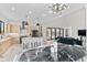 Open-concept living space featuring dining room, living room and kitchen at 10291 E 142Nd Ave, Brighton, CO 80602