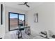 Bright office space with a large window, modern desk, and neutral tones, ideal for a home workspace at 10291 E 142Nd Ave, Brighton, CO 80602