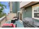 A charming patio with seating, a gas grill, and a fire pit, great for outdoor entertaining at 9503 Longs Peak Dr, Commerce City, CO 80640