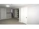 Finished basement with extra storage and carpeting at 6769 W Fair Dr, Littleton, CO 80123