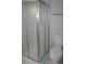 Updated bathroom with a shower and white toilet at 6769 W Fair Dr, Littleton, CO 80123