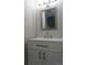 Clean bathroom featuring a vanity with black hardware at 6769 W Fair Dr, Littleton, CO 80123