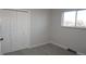 Bright bedroom with double closet and neutral decor at 6769 W Fair Dr, Littleton, CO 80123