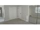Spacious bedroom with double closets and mirrored doors at 6769 W Fair Dr, Littleton, CO 80123