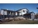 Updated home exterior boasts modern paint and landscaping at 6769 W Fair Dr, Littleton, CO 80123