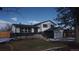 Stunning two-story home with a gray and white exterior at 6769 W Fair Dr, Littleton, CO 80123