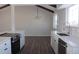 Modern kitchen with stainless steel appliances and island at 6769 W Fair Dr, Littleton, CO 80123