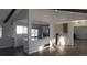 Renovated kitchen features white cabinets and quartz countertops at 6769 W Fair Dr, Littleton, CO 80123