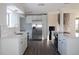 Bright kitchen offers stainless steel appliances and hardwood floors at 6769 W Fair Dr, Littleton, CO 80123