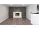 Living room features a fireplace and built-in shelving at 6769 W Fair Dr, Littleton, CO 80123