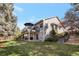 Lush backyard with a spacious deck and patio, perfect for outdoor entertaining at 2533 W 110Th Ave, Westminster, CO 80234