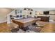Basement featuring a pool table, overhead lighting, and finished basement at 2533 W 110Th Ave, Westminster, CO 80234