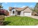 Charming single-Gathering home showcasing a well-manicured lawn, complemented by a brick and gray color scheme at 2533 W 110Th Ave, Westminster, CO 80234