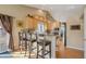 Bright and open kitchen featuring a breakfast bar, wooden cabinets, and stainless steel appliances, perfect for casual dining at 2533 W 110Th Ave, Westminster, CO 80234