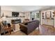 Cozy living room featuring a fireplace, recessed lighting, and a walk-out patio at 2533 W 110Th Ave, Westminster, CO 80234